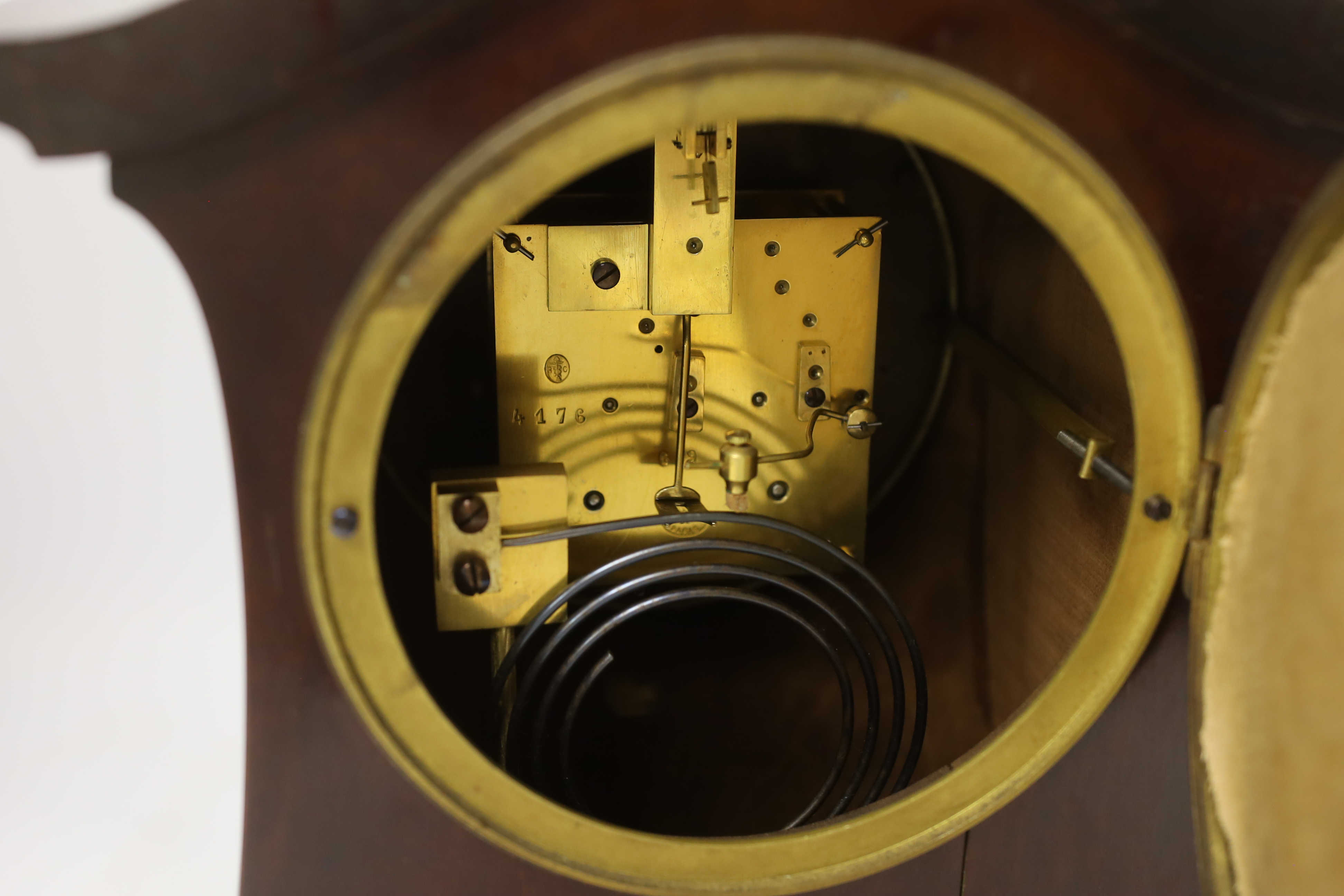 A late Victorian carved mahogany mantel clock, key no pendulum, 35cm